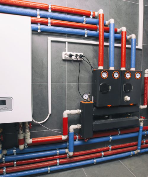 A modern electic boiler room. Equipment for modern heating system as a boiler, heater,pipes, expansion tank and other